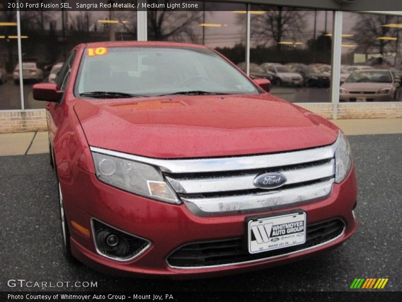 Sangria Red Metallic / Medium Light Stone 2010 Ford Fusion SEL