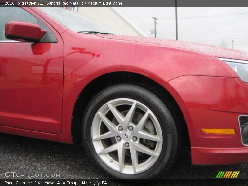 Sangria Red Metallic / Medium Light Stone 2010 Ford Fusion SEL