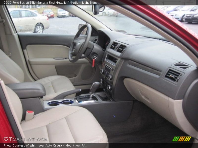 Sangria Red Metallic / Medium Light Stone 2010 Ford Fusion SEL