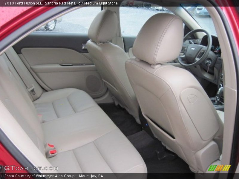 Sangria Red Metallic / Medium Light Stone 2010 Ford Fusion SEL