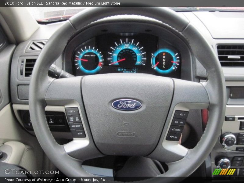 Sangria Red Metallic / Medium Light Stone 2010 Ford Fusion SEL