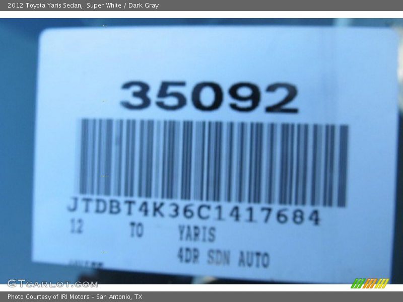 Super White / Dark Gray 2012 Toyota Yaris Sedan