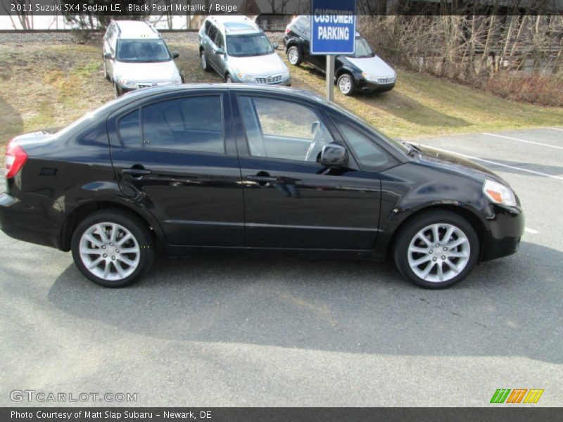 Black Pearl Metallic / Beige 2011 Suzuki SX4 Sedan LE