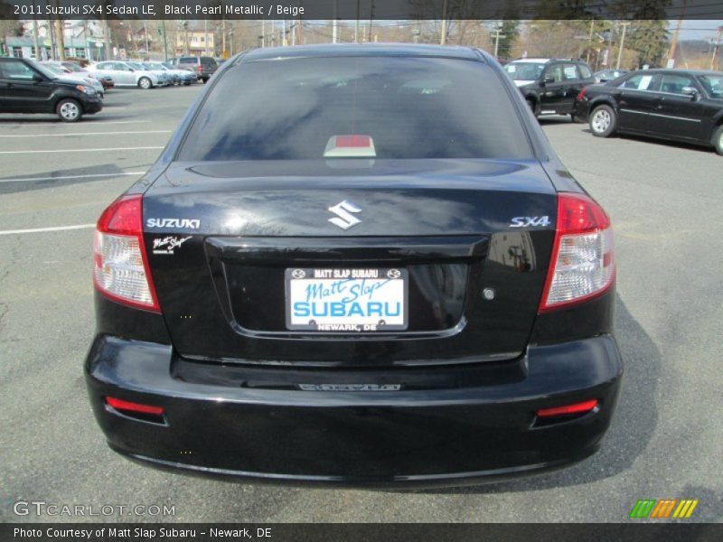 Black Pearl Metallic / Beige 2011 Suzuki SX4 Sedan LE