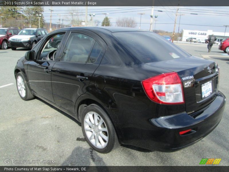 Black Pearl Metallic / Beige 2011 Suzuki SX4 Sedan LE