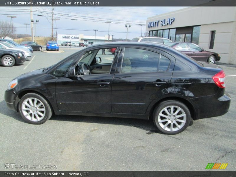 Black Pearl Metallic / Beige 2011 Suzuki SX4 Sedan LE