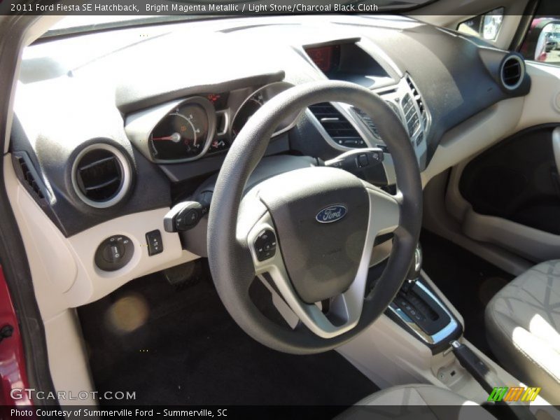 Bright Magenta Metallic / Light Stone/Charcoal Black Cloth 2011 Ford Fiesta SE Hatchback