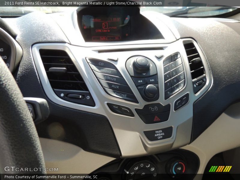 Bright Magenta Metallic / Light Stone/Charcoal Black Cloth 2011 Ford Fiesta SE Hatchback