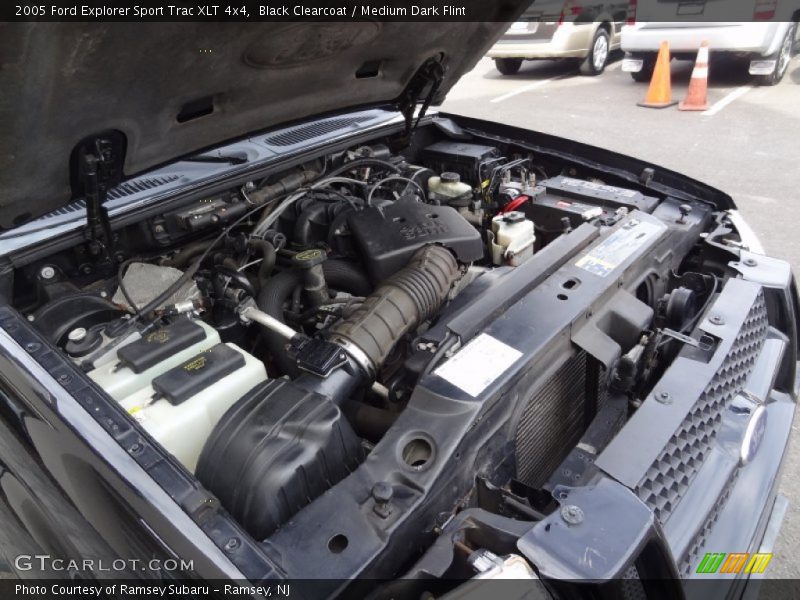 Black Clearcoat / Medium Dark Flint 2005 Ford Explorer Sport Trac XLT 4x4
