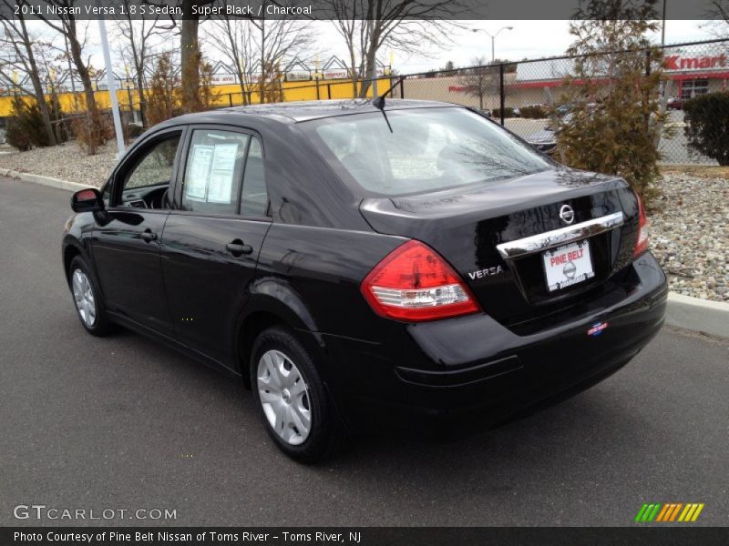 Super Black / Charcoal 2011 Nissan Versa 1.8 S Sedan