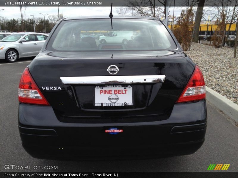 Super Black / Charcoal 2011 Nissan Versa 1.8 S Sedan