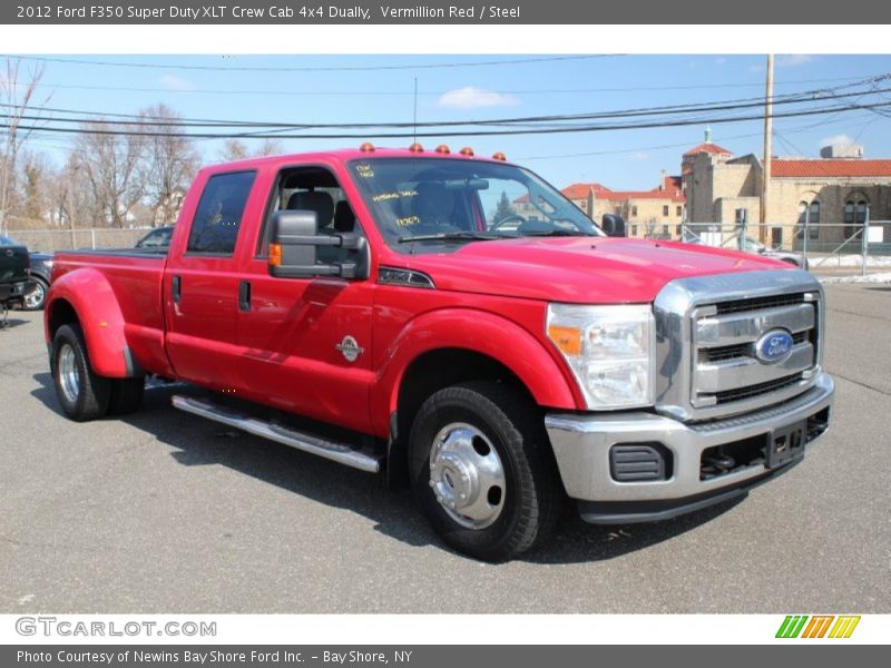 Front 3/4 View of 2012 F350 Super Duty XLT Crew Cab 4x4 Dually