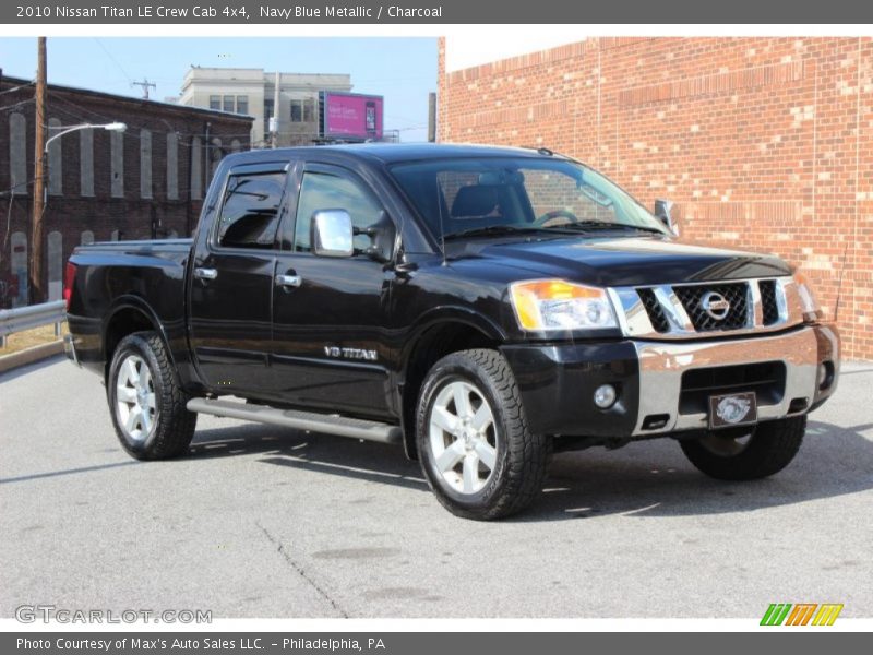 Front 3/4 View of 2010 Titan LE Crew Cab 4x4