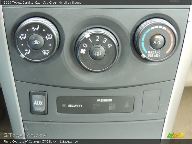 Capri Sea Green Metallic / Bisque 2009 Toyota Corolla