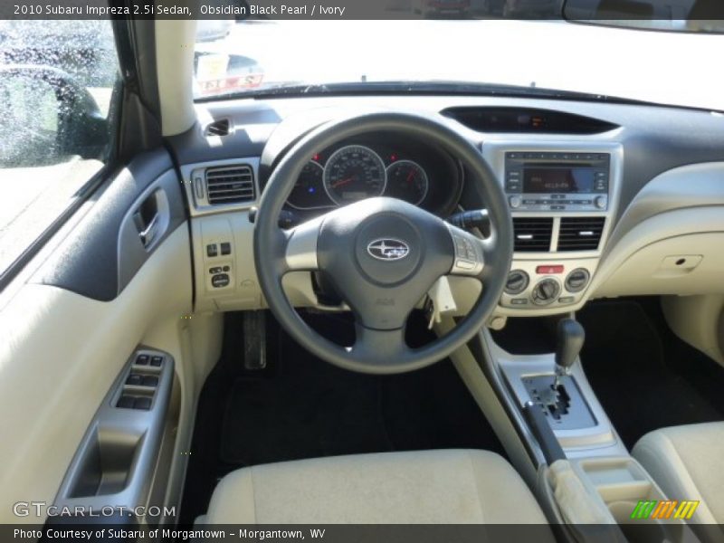 Obsidian Black Pearl / Ivory 2010 Subaru Impreza 2.5i Sedan