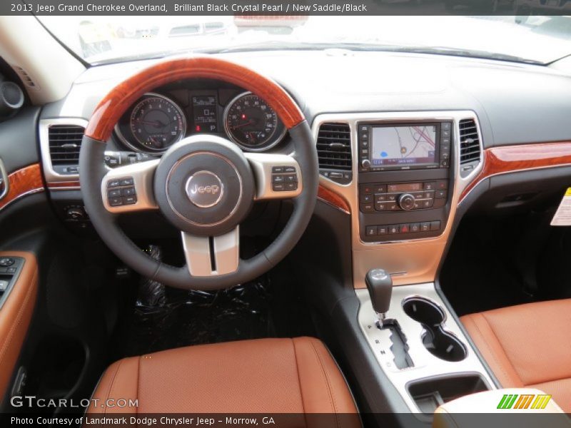 Brilliant Black Crystal Pearl / New Saddle/Black 2013 Jeep Grand Cherokee Overland