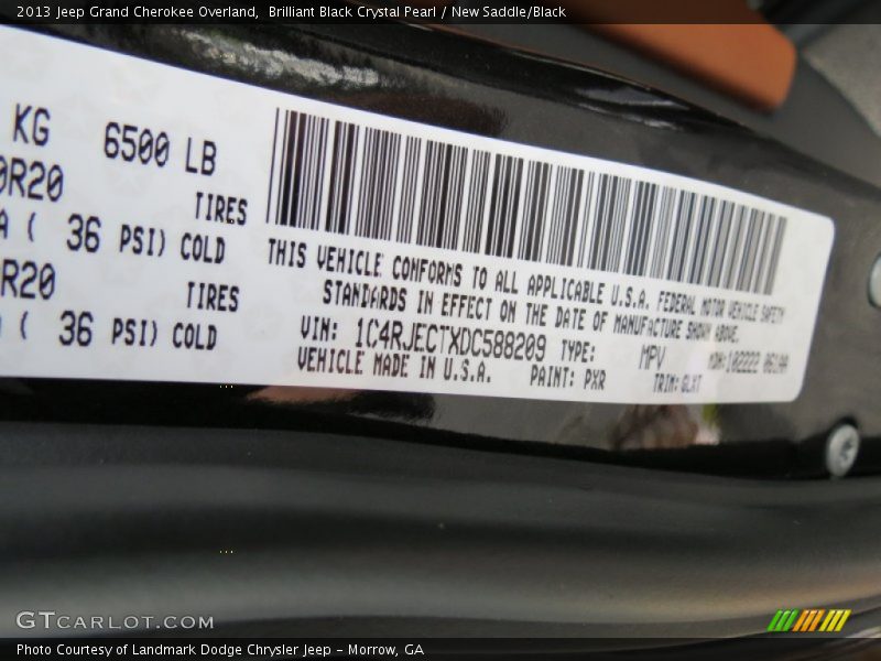 Brilliant Black Crystal Pearl / New Saddle/Black 2013 Jeep Grand Cherokee Overland