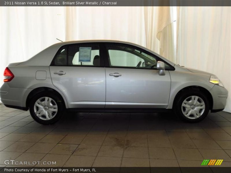 Brilliant Silver Metallic / Charcoal 2011 Nissan Versa 1.8 SL Sedan