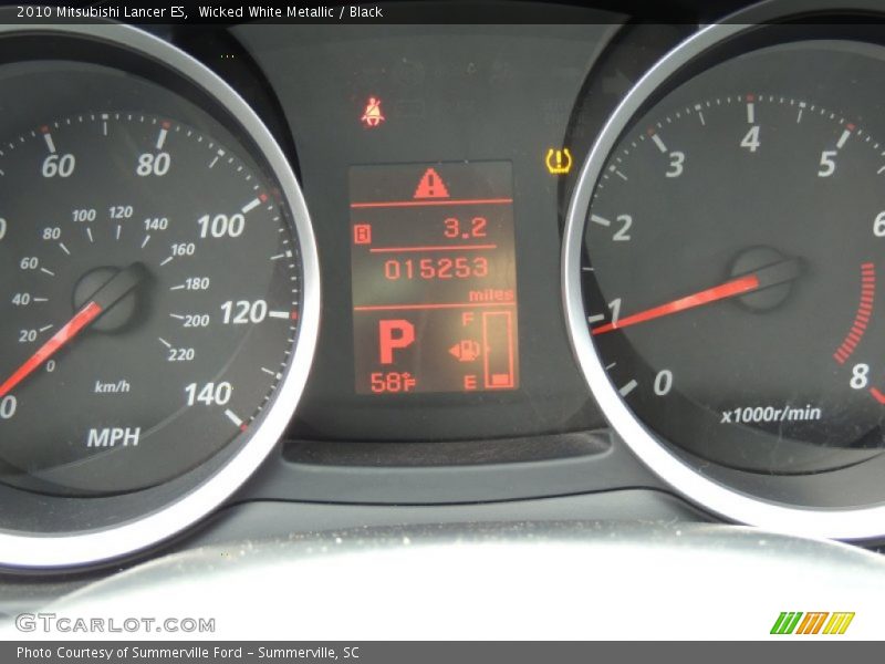 Wicked White Metallic / Black 2010 Mitsubishi Lancer ES