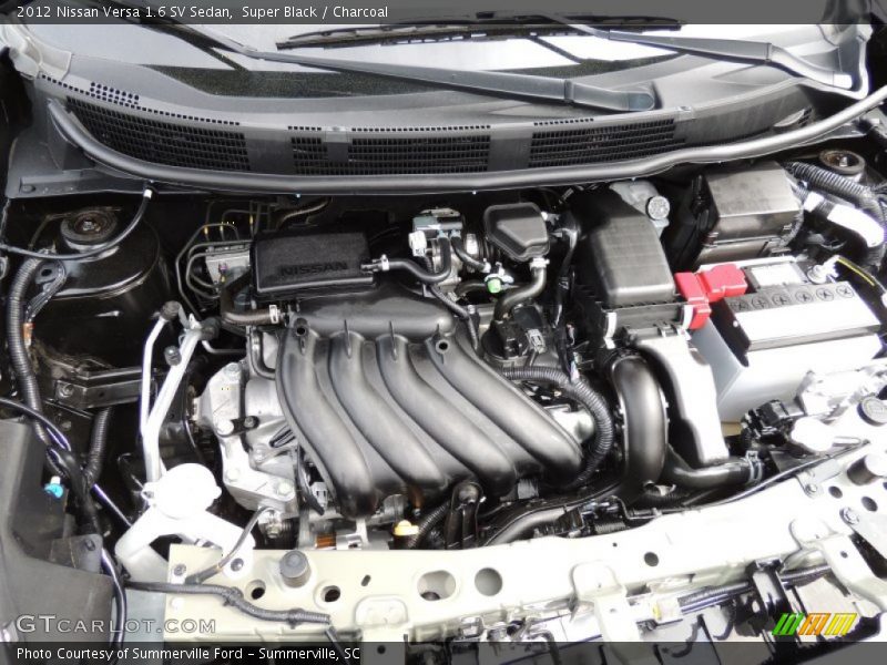Super Black / Charcoal 2012 Nissan Versa 1.6 SV Sedan