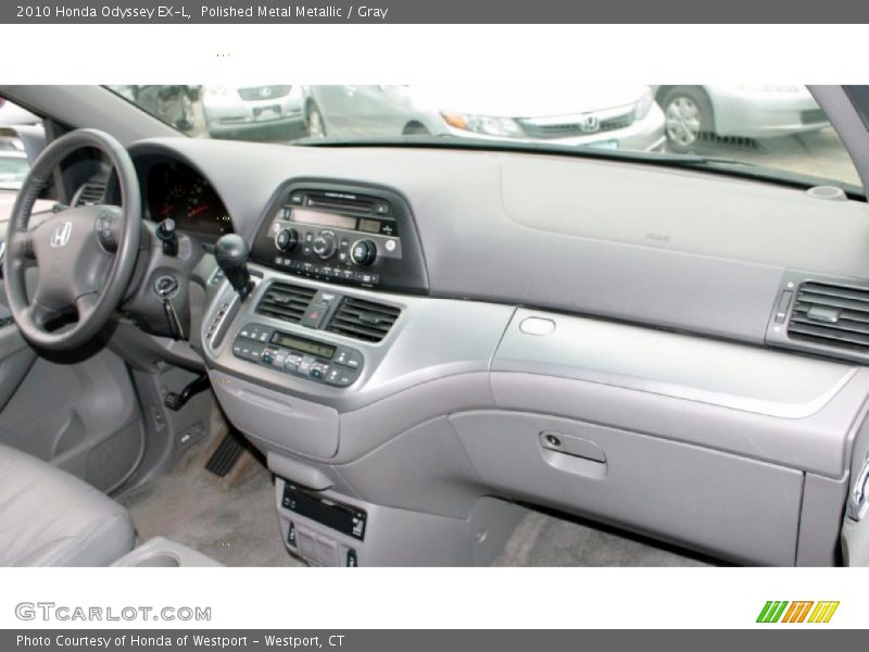 Polished Metal Metallic / Gray 2010 Honda Odyssey EX-L