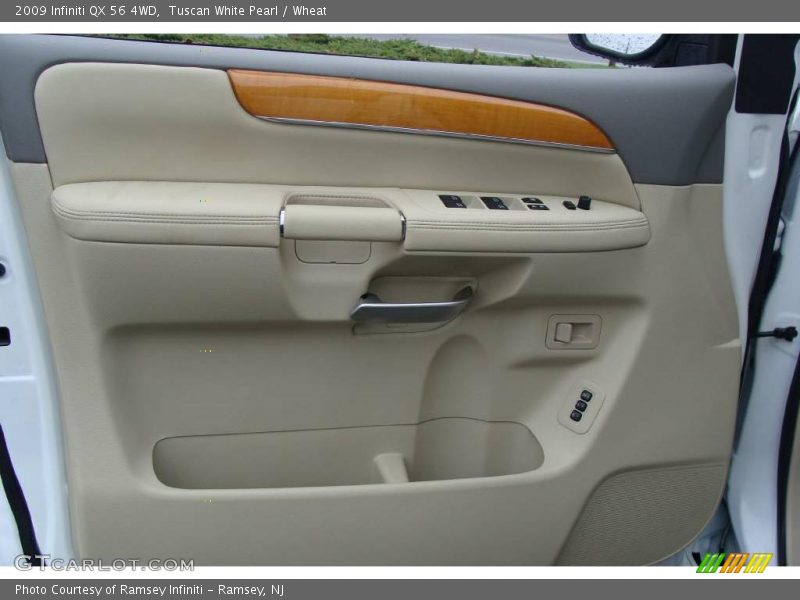 Tuscan White Pearl / Wheat 2009 Infiniti QX 56 4WD