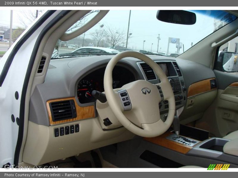 Tuscan White Pearl / Wheat 2009 Infiniti QX 56 4WD