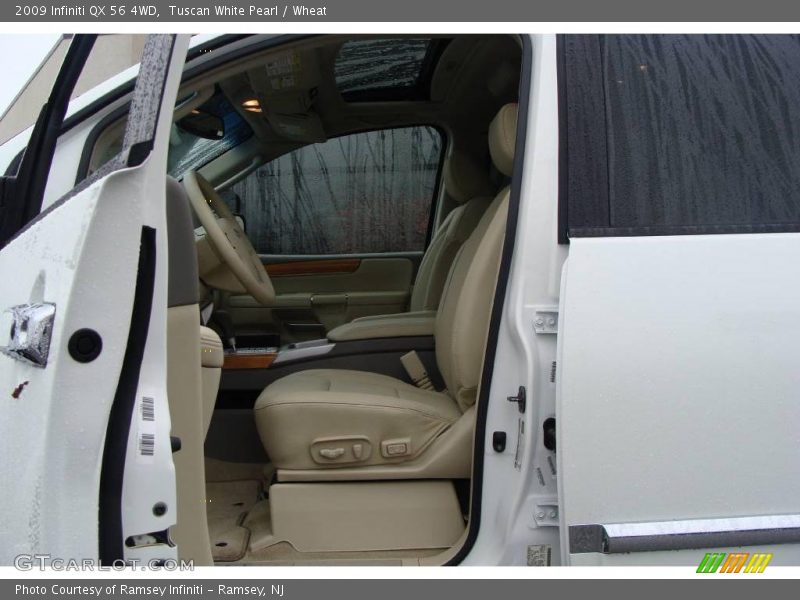 Tuscan White Pearl / Wheat 2009 Infiniti QX 56 4WD