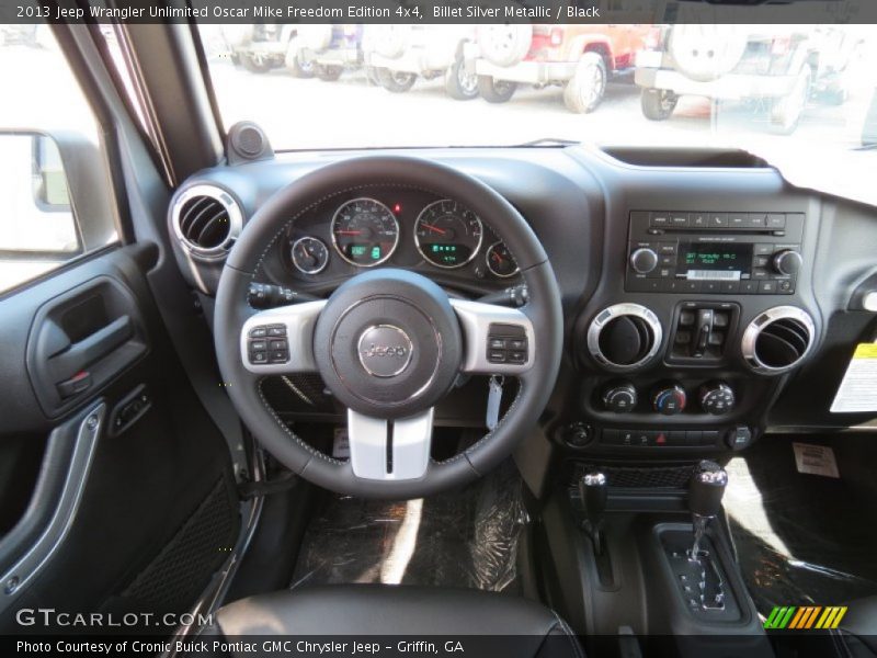 Dashboard of 2013 Wrangler Unlimited Oscar Mike Freedom Edition 4x4