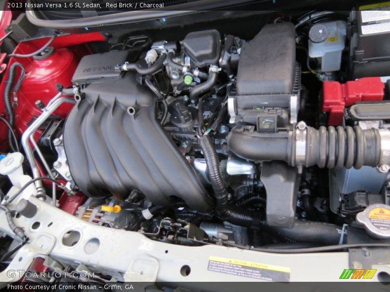 Red Brick / Charcoal 2013 Nissan Versa 1.6 SL Sedan