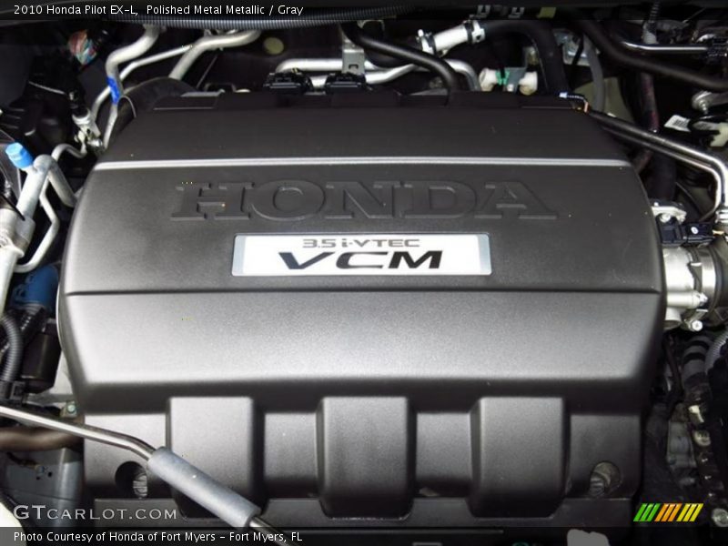 Polished Metal Metallic / Gray 2010 Honda Pilot EX-L