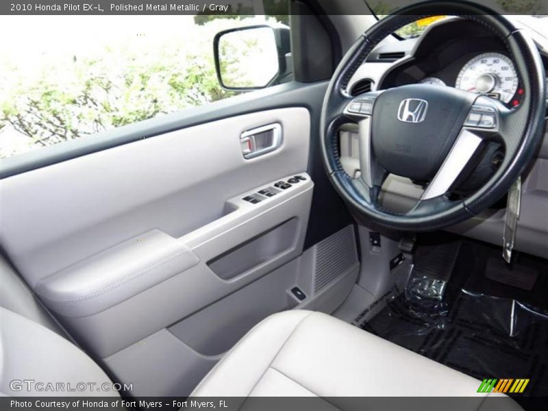 Polished Metal Metallic / Gray 2010 Honda Pilot EX-L