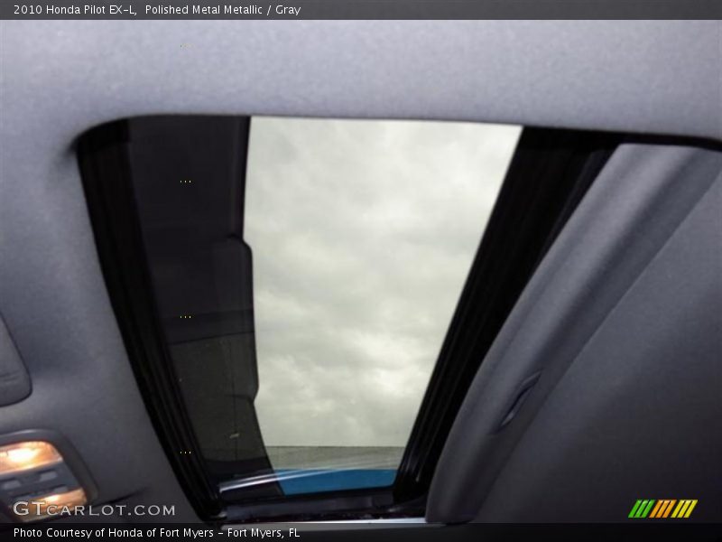 Polished Metal Metallic / Gray 2010 Honda Pilot EX-L