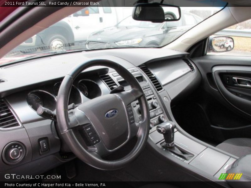 Red Candy / Charcoal Black 2011 Ford Taurus SEL