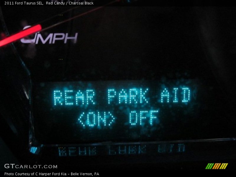 Red Candy / Charcoal Black 2011 Ford Taurus SEL