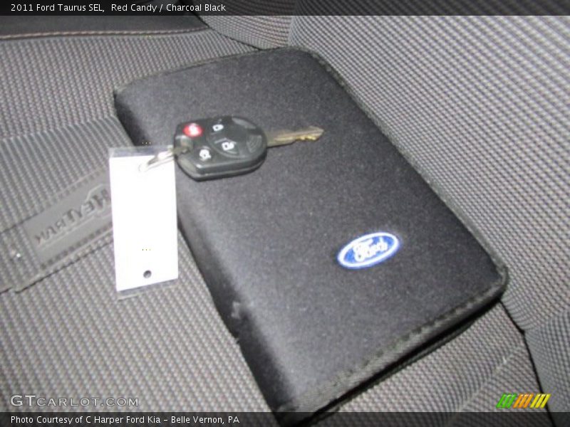 Red Candy / Charcoal Black 2011 Ford Taurus SEL