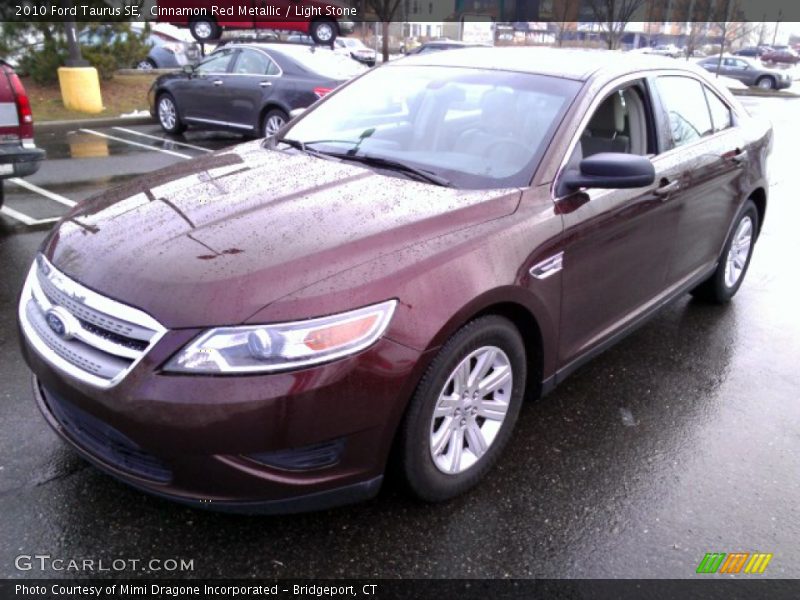 Cinnamon Red Metallic / Light Stone 2010 Ford Taurus SE
