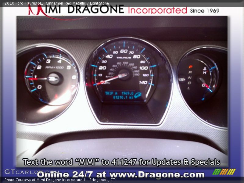 Cinnamon Red Metallic / Light Stone 2010 Ford Taurus SE