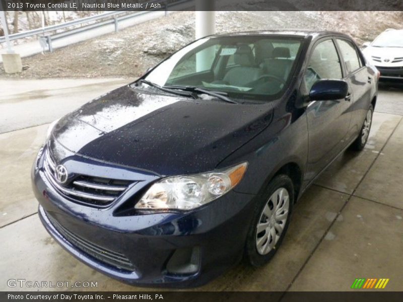 Front 3/4 View of 2013 Corolla LE