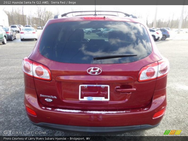 Sierra Red / Beige 2012 Hyundai Santa Fe GLS AWD