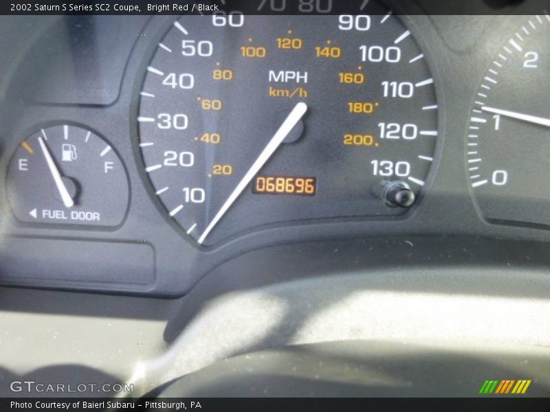 Bright Red / Black 2002 Saturn S Series SC2 Coupe