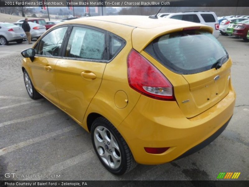 Yellow Blaze Metallic Tri-Coat / Charcoal Black/Blue Cloth 2011 Ford Fiesta SES Hatchback