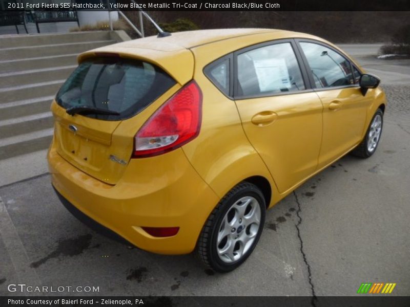 Yellow Blaze Metallic Tri-Coat / Charcoal Black/Blue Cloth 2011 Ford Fiesta SES Hatchback