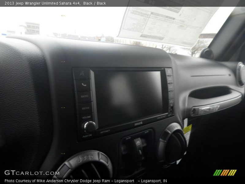 Black / Black 2013 Jeep Wrangler Unlimited Sahara 4x4