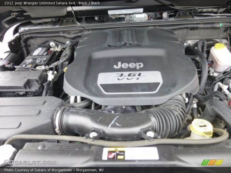Black / Black 2012 Jeep Wrangler Unlimited Sahara 4x4