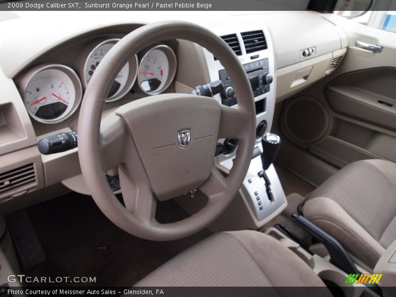 Sunburst Orange Pearl / Pastel Pebble Beige 2009 Dodge Caliber SXT