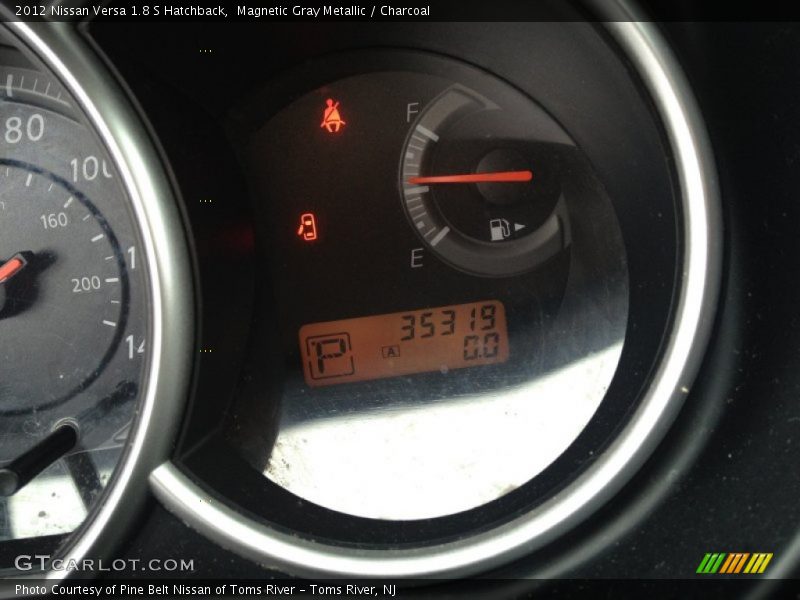 Magnetic Gray Metallic / Charcoal 2012 Nissan Versa 1.8 S Hatchback