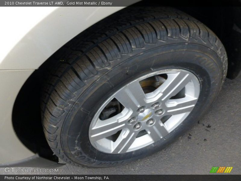 Gold Mist Metallic / Ebony 2010 Chevrolet Traverse LT AWD