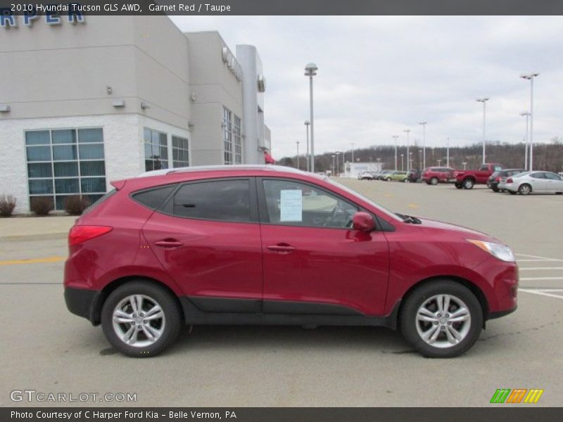 Garnet Red / Taupe 2010 Hyundai Tucson GLS AWD