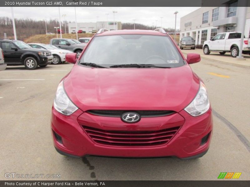 Garnet Red / Taupe 2010 Hyundai Tucson GLS AWD